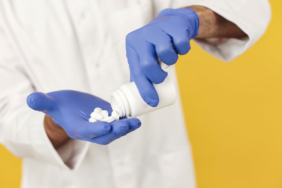 Pharmacogenomics Testing: How Your DNA Affects Medication Response close up of a healthcare worker in gloves pouring pills from
