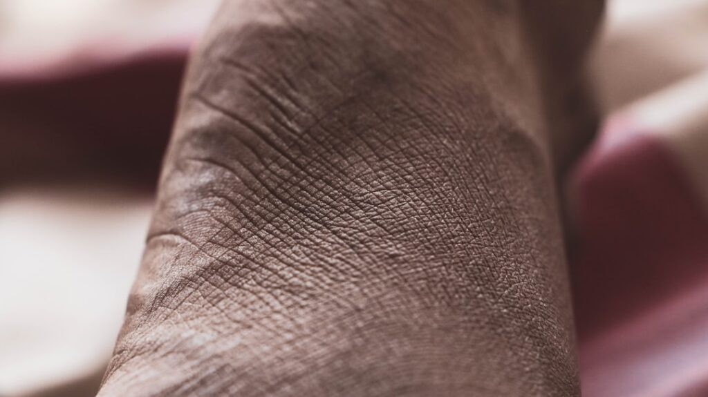 Inflammation Markers for Chronic Disease Prevention and Early Detection a close up of a person s foot with a pink blanket