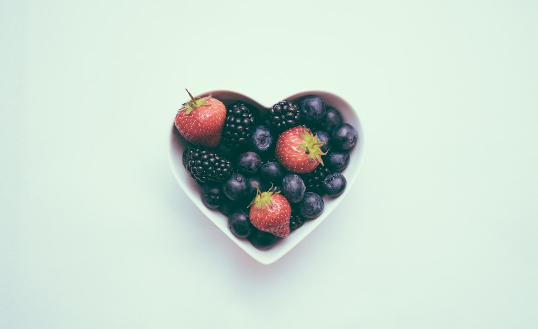 Health Screening Timeline by Age: What Tests You Need and When heart-shaped bowl with strawberries