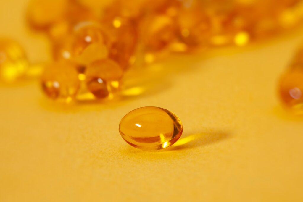 Vitamin D Status Testing and Optimal Level Recommendations brown gel close up photography